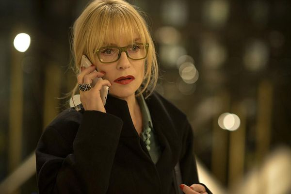 Isabelle Huppert as Maureen Kearney: “We wanted to represent her physically as close as possible - hence the blonde chignon hair style, the jewellery, the bright red lipstick and her glasses.”