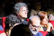 Face in the crowd at a Festival screening: Mark Cousins, centre, will present the final chapter in his history of cinema at the Cannes Film Festival