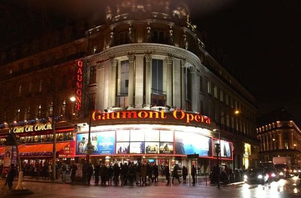 Crowds gather outside the Gaumont Opera for a special screening of Patrice Leconte’s Do Not Disturb (Une heure de tranquillité)
