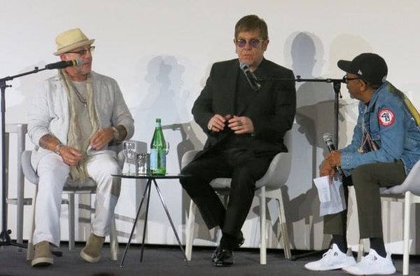 Bernie Taupin and Elton John join discussion moderated by Spike Lee, right.