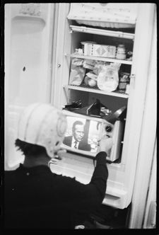 Sara Driver on one of Alexis Adler’s candid images of Jean-Michel Basquiat: “You photographed him putting the TV into the refrigerator with the helmet on!”