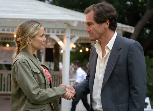 Simone Cleary (Kate Hudson) greets Shriver (Michael Shannon) in Michael Maren’s whimsical A Little White Lie