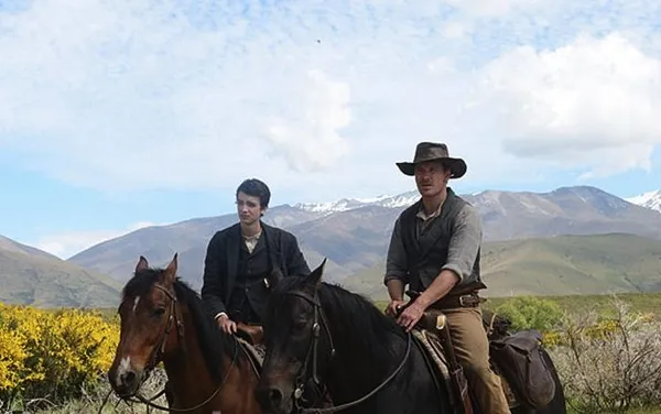 Kodi Smit-McPhee and Michael Fassbender