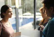 Orna (Liron Ben-Shlush) with Benny (Menashe Noy) and his wife (Dorit Lev-Ari): "Sexual harassment doesn't stay just with you, it's not just your doing. It's something that affects everybody."