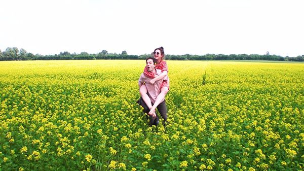 Luisa (Lou Strenger) and Chrissimo (Christoph Bertram) get distracted by the wildflowers on their way to his parents, Ferhat (Ferhat Kaleli) and Peter (Peter Brachschoss) in Florian Schmitz’ smartly edited Le Pré Du Mal