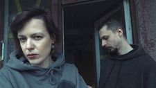 Lyana Mytsko with Stepan Burban (aka rapper Palindrom) in their apartment