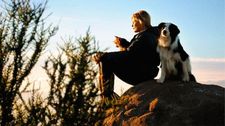 Mariel Hemingway on the rocks with her dogs in Ketchum, Idaho.