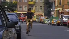 Mark Reeder, our witty, inquisitive and entrepreneurial tour guide, cycling through West Berlin
