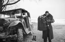 German Corporal Willi Herold (Max Hubacher) finds a captain's uniform.