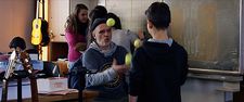 Mr. Bachmann not only juggles tennis balls, he is adept at juggling the different personalities of his students