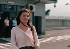 Television reporter Karinée (Narine Grigoryan) on the scene