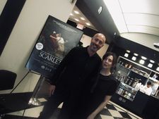 Cinecittà Studios Chief Nicola Maccanico with Anne-Katrin Titze in front of the US Scarlet poster at Open Roads: New Italian Cinema in New York