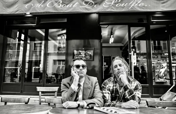 Godard lookalike Guillaume Marbeck (left) and Richard Linklater on the set of Nouvelle Vague