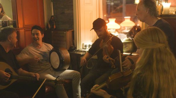 Musicians Eoin O’Neill, Kieran O’Connell, Adam Shapiro Christy Mc Namara and Beth Tipton at Fitzpatrick’s Bar in Lila Schmitz’s The Job Of Songs