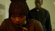 Babetida Sadjo and Souleymane Sy Savane in Our Father, The Devil