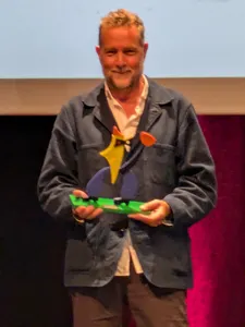 Phedon Papamichal with his award
