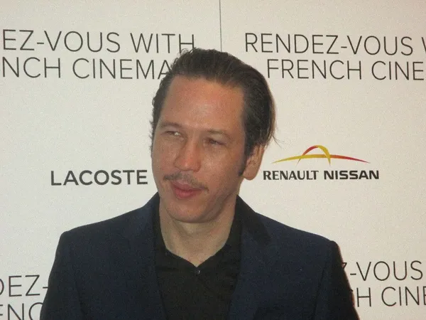 Reda Kateb as Django Reinhardt