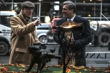 Norman (Richard Gere) with Micha Eshel (Lior Ashkenazi) at Lanvin shop window: "So combining these $1200 shoes with the piss of a dog …"