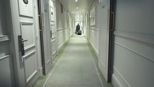 Robert Fripp walking down the hotel corridor of life