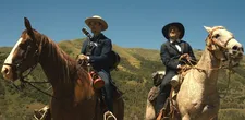 ‪David Zellner‬ (here as Parson Henry) on ‪Robert Pattinson‬'s Samuel singing Honeybun in Damsel: "We like it when there's cowboy ballads."