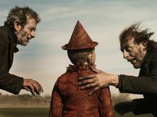The Cat (Rocco Papaleo) and the Fox (Massimo Ceccherini) conning Pinocchio (Federico Ielapi) in Matteo Garrone’s Pinocchio