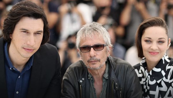 Film team from Annette face the cameras before last night’s world premiere at the Cannes Film Festival (from left) Adam Driver, director Leos Carax and star Marion Cotillard