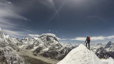 A local climber ascends a peak in Sherpa