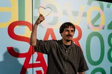 Stefan Dordevic with his award