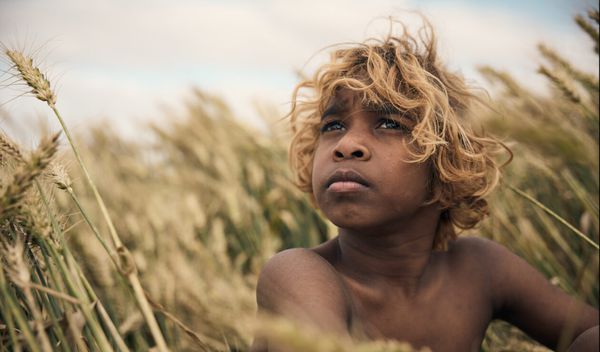 Aswan Reid as The New Boy.  Warwick Thornton: 'It's trying to get recognition of something that is there for indigenous people, that is always dismissed by organised religion, in a way, even though ours is organised as well.'