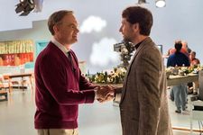 Mister Rogers (Tom Hanks) greets journalist Lloyd Vogel (Matthew Rhys)