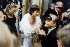 Truman Capote greets his guests at the Black and White Ball at The Plaza