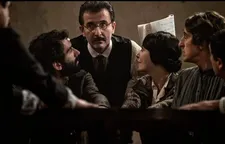 Onofrio Principato (Valentino Picone) with the theatre company