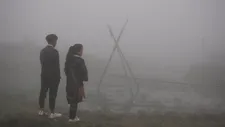 Di with Vang in the mist