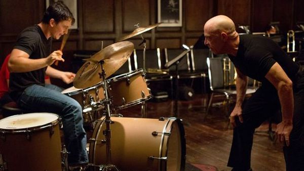 Miles Teller as a young jazz drummer under the tutelage of a maestro of jazz played by JK Simmons in Whiplash.