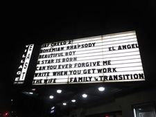 Write When You Get Work on the Village East Cinema marquee in New York