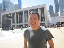 Pit Stop director Yen Tan on the plaza of Lincoln Center during New York Fashion Week