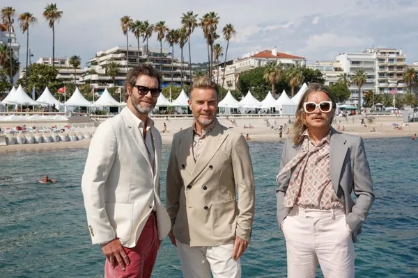 Howard Donald, Gary Barlow and Mark Owen in Cannes