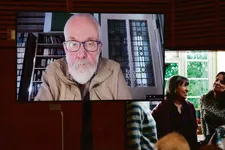Mike Leigh dialling in to the press conference in San Sebastian