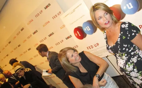 Katie Couric shares a laugh at the Fed Up MoMA premiere with fellow US journalist Savannah Guthrie, who is expecting: "I'm pregnant now, and that is a huge perspective changer in terms of what you put in your body"