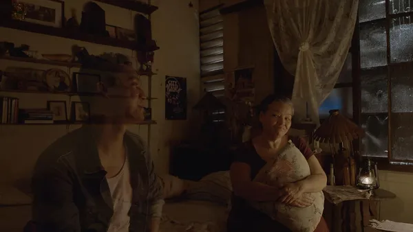 Ronwaldo (Anthony Falcon) and Leonor (Sheila Francisco) in Leonor Will Never Die. Martika Ramirez Escobar: 'The presence of the ghost is inspired by a true story of my own grandma, who would say of her son, who did pass away, that she would sometimes feel his presence in her bed'