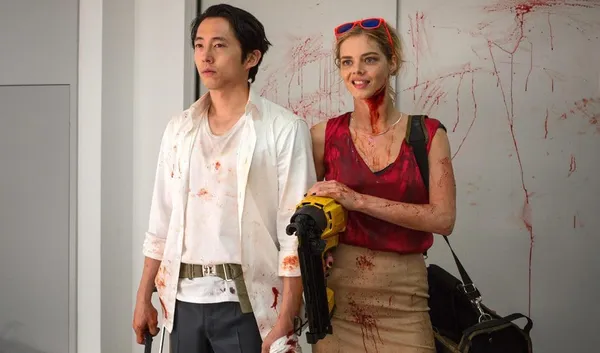 Steven Yeun and Samara Weaving in Mayhem