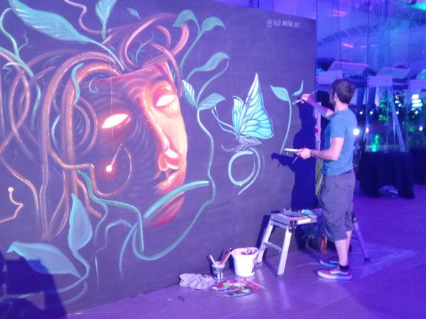 Ross MacRae working on his art at EIFF's closing night party
