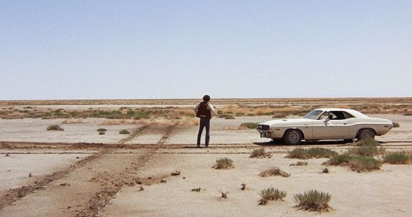 Barry Newman alongside the iconic white Dodge Challenger in Vanishing Point