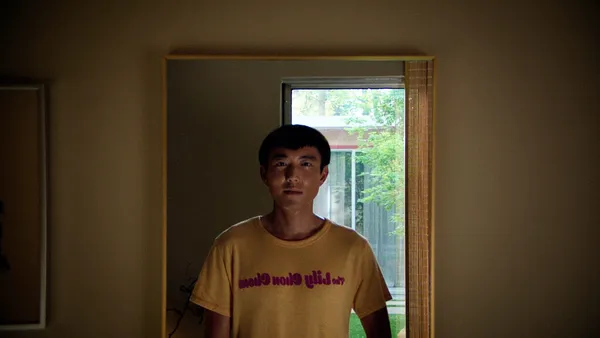 Justin H Min as Yang. He says of his character: 'I think as an actor, the thing that I wanted to be most specific about in my approach and my preparation was his relationship to each of the characters, which I felt was very distinct and unique'