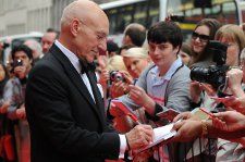 Sir Patrick Stewart signs autographs for fans